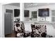 Kitchen bar includes cow-print bar stools and granite countertops, adding style to a modern kitchen at 2801 E Shoreham St, Durham, NC 27707