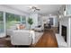 Spacious living room boasts hardwood floors, abundant natural light, and easy access to the dining room at 2801 E Shoreham St, Durham, NC 27707