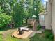 Backyard with patio, outdoor seating, and deck creates an ideal space for relaxation at 2925 Dargan Hills Dr, Wake Forest, NC 27587