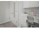 Bedroom with a built-in desk, three-drawer cabinet, and mirrored closet door at 2925 Dargan Hills Dr, Wake Forest, NC 27587