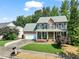Beautiful brick home featuring a well-maintained lawn, mature trees, and a classic design at 2925 Dargan Hills Dr, Wake Forest, NC 27587