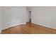 Bedroom with hardwood floors and closet for storage at 296 Gordon Farm Dr, Benson, NC 27504