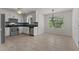 Bright eat-in kitchen featuring white cabinets, stainless steel appliances, and natural light at 296 Gordon Farm Dr, Benson, NC 27504