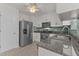 Well-equipped kitchen with stainless steel appliances and granite countertops at 296 Gordon Farm Dr, Benson, NC 27504