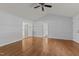 Spacious living room features hardwood floors and open doorways, creating an inviting atmosphere at 296 Gordon Farm Dr, Benson, NC 27504