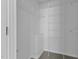 A walk-in closet with installed white wire shelving for optimal storage and organization at 296 Gordon Farm Dr, Benson, NC 27504
