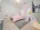 Charming bedroom with a cozy bed, decorative accents, and a teepee, creating a playful and inviting space at 301 Porter Hill Dr, Youngsville, NC 27596