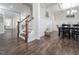 Elegant dining room with coffered ceilings, shiplap accent wall, and hardwood floors at 301 Porter Hill Dr, Youngsville, NC 27596