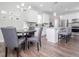Eat-in kitchen with stainless steel appliances, granite countertops, and island with bar seating at 301 Porter Hill Dr, Youngsville, NC 27596