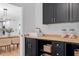Mudroom featuring black cabinets, butcher block countertop, a sink, and decor at 3032 Dixon Rd, Durham, NC 27707