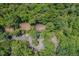 Aerial view of the community with lush greenery, building rooftops and parking areas at 3086 Colony Rd # C, Durham, NC 27705