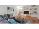 Cozy living room showcasing a fireplace, built-in shelving, and stylish decor for a relaxed ambiance at 3086 Colony Rd # C, Durham, NC 27705