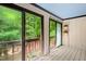 Sunroom features beautiful outdoor views and access to a balcony at 3086 Colony Rd # C, Durham, NC 27705