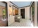 Cozy sunroom with tile flooring and access to outdoor views at 3086 Colony Rd # C, Durham, NC 27705