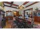 Spacious dining room with coffered ceiling, hardwood floor and adjacent sitting area at 309 W Divine St, Dunn, NC 28334
