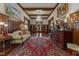 Grand foyer with decorative wood trim, hardwood floors, and elegant chandelier at 309 W Divine St, Dunn, NC 28334