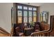 Charming hallway with stained glass windows, decorative mirrors and ornate woodwork at 309 W Divine St, Dunn, NC 28334