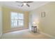 Inviting bedroom with neutral walls, a ceiling fan, and a bright window at 315 Allister Dr, Raleigh, NC 27609