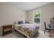 Comfortable bedroom featuring natural light, neutral colors, and stylish furnishings at 317 Striped Maple Ct, Apex, NC 27539