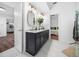 Bathroom with double vanity, marble countertop, and modern fixtures at 3400 Appling Way, Durham, NC 27703