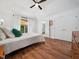 Bright main bedroom with hardwood floors and natural lighting at 3400 Appling Way, Durham, NC 27703
