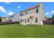 Large grassy backyard with fence and neutral exterior at 40 Horizon Trl, Garner, NC 27529