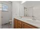Bright bathroom features double sinks and vanity lighting creating a modern design at 40 Horizon Trl, Garner, NC 27529