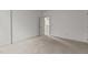 Neutral bedroom with carpet, a door leading to another room, and baseboard trim at 40 Horizon Trl, Garner, NC 27529