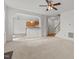 Open-concept living area, leading to the kitchen and stairway access to the second floor at 40 Horizon Trl, Garner, NC 27529
