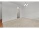 Bright living room featuring carpet floors, neutral color scheme, and natural light at 40 Horizon Trl, Garner, NC 27529