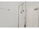 Bathroom shower featuring sleek glass doors and modern fixtures at 40 Horizon Trl, Garner, NC 27529