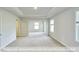 Bedroom with carpet and trey ceiling, and bright natural light at 405 Falls Bluff Dr, Wake Forest, NC 27596