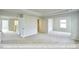 Bedroom with carpet that is connected to a bathroom and closet space at 405 Falls Bluff Dr, Wake Forest, NC 27596