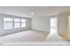 Spacious bonus room with plush carpeting and bright natural light at 405 Falls Bluff Dr, Wake Forest, NC 27596