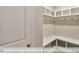 Mudroom area with cubbies, hooks, and bench for organization at 405 Falls Bluff Dr, Wake Forest, NC 27596