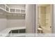 Mudroom entrance adjacent to bathroom and storage at 405 Falls Bluff Dr, Wake Forest, NC 27596