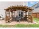 Backyard patio and pergola perfect for outdoor dining and entertaining at 4712 Rockport Dr, Durham, NC 27703