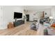Inviting living room with wood-look flooring, decorative accents, and natural light at 4712 Rockport Dr, Durham, NC 27703