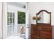 The bedroom features french doors that lead to a balcony at 507 Rosengarten Aly, Raleigh, NC 27603