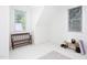 Spacious bedroom with sloped ceilings, natural light, and staged workout space at 507 Rosengarten Aly, Raleigh, NC 27603