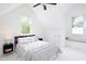Bright bedroom with a ceiling fan, comfortable bed, and natural light at 507 Rosengarten Aly, Raleigh, NC 27603