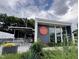 Vault Craft Beer exterior with a modern design, a patio with picnic tables, and landscaped surroundings at 507 Rosengarten Aly, Raleigh, NC 27603