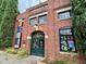 Videri Chocolate Factory with red brick facade, signage, and vibrant street decorations at 507 Rosengarten Aly, Raleigh, NC 27603