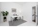 Bright home office with a minimalist desk, comfortable chair, and natural light at 507 Rosengarten Aly, Raleigh, NC 27603