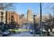 Street view of residential street with city skyline in the background at 507 Rosengarten Aly, Raleigh, NC 27603