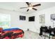 The bedroom with grey carpet, an office area, and wall art for a personalized touch at 514 Alamanni Ct, Graham, NC 27253