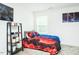 bedroom featuring bright decor, carpeted floor, and an eye-catching bedding set at 514 Alamanni Ct, Graham, NC 27253