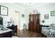 Well-appointed home office with stylish decor, desk space, and ample natural light at 514 Alamanni Ct, Graham, NC 27253