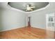 Spacious primary bedroom featuring bamboo flooring and an ensuite bathroom at 5421 Brandy Bay Rd, Raleigh, NC 27613