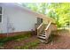 Features a cozy wooden deck that provides a perfect outdoor space to sit and relax outdoors at 622 Enon Rd, Oxford, NC 27565